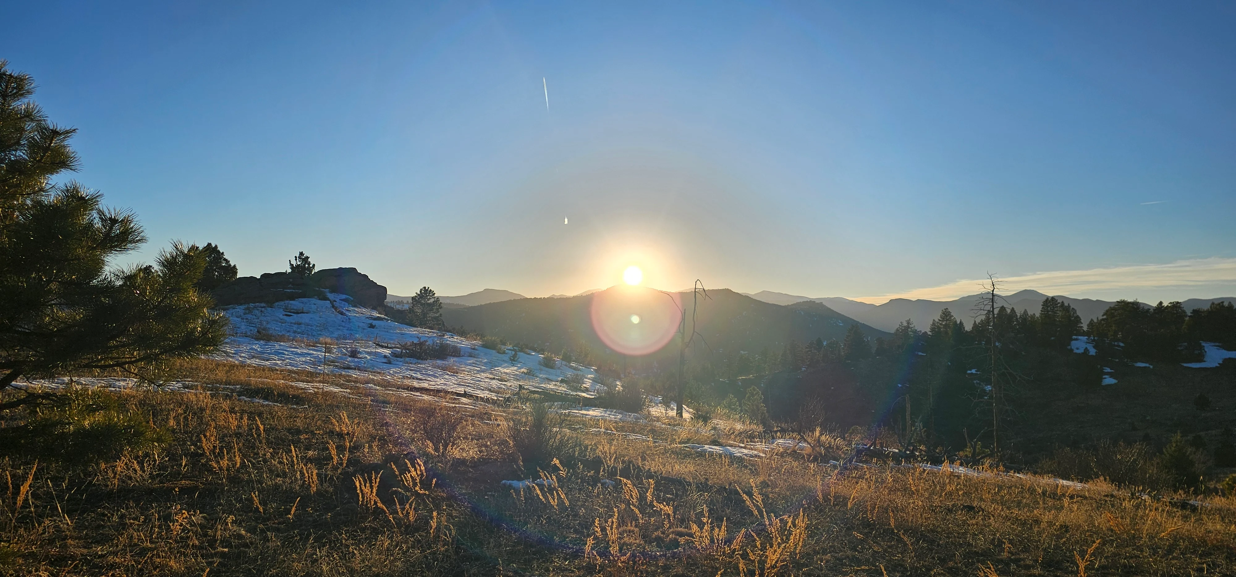 sunrise over mountain highway